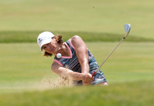 Juli Inkster gets out of the sand trap in the back half of the inaugural U.S. Senior Women's Open Championship held at Chicago Golf Club in Wheaton July 15.
